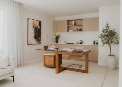 Light-filled, sophisticated home office with modern furnishings and bright décor