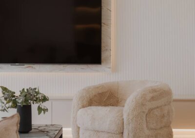 Fluffy swivelling armchair in a bright, light-filled lounge room with modern styling