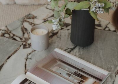 Styled stone coffee table in a contemporary lounge with decorative accents